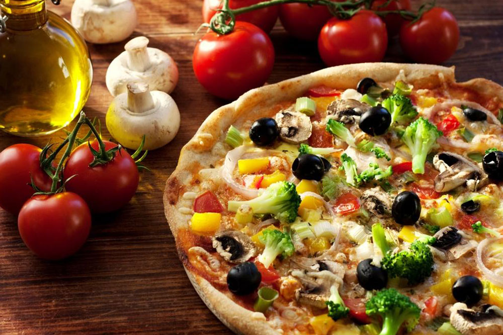 The Evolution of Pizza: From Humble Origins to Global Icon