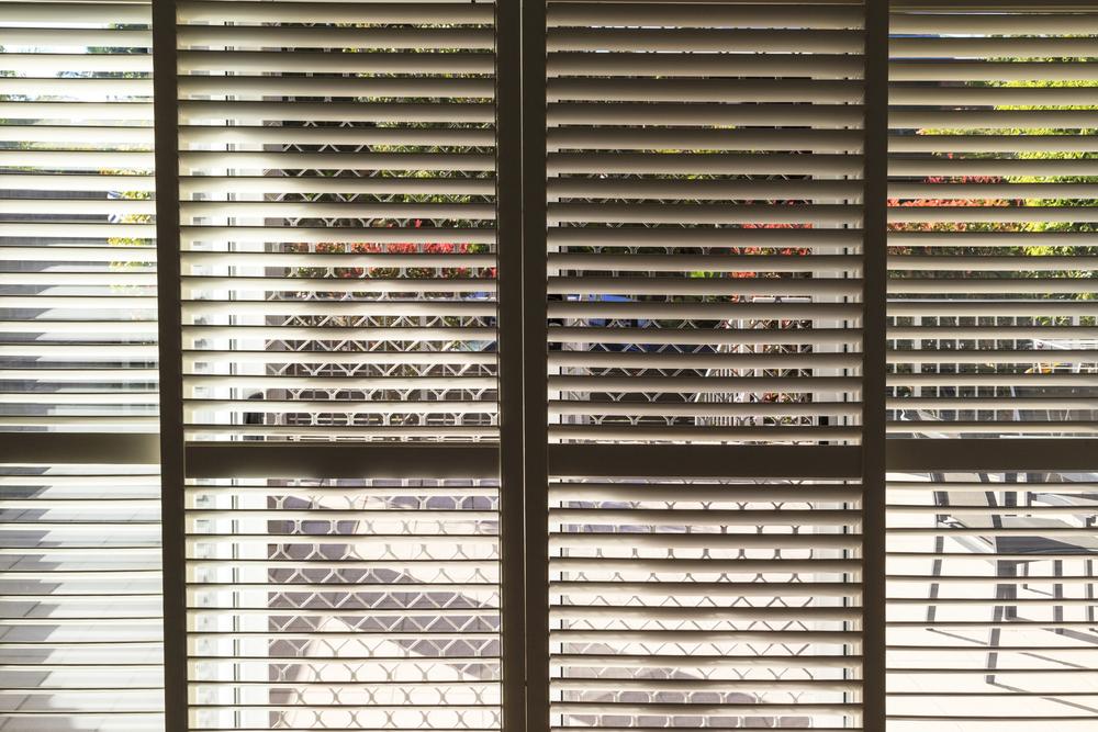 Enhance Your Windows with Stylish Roman Shade Designs