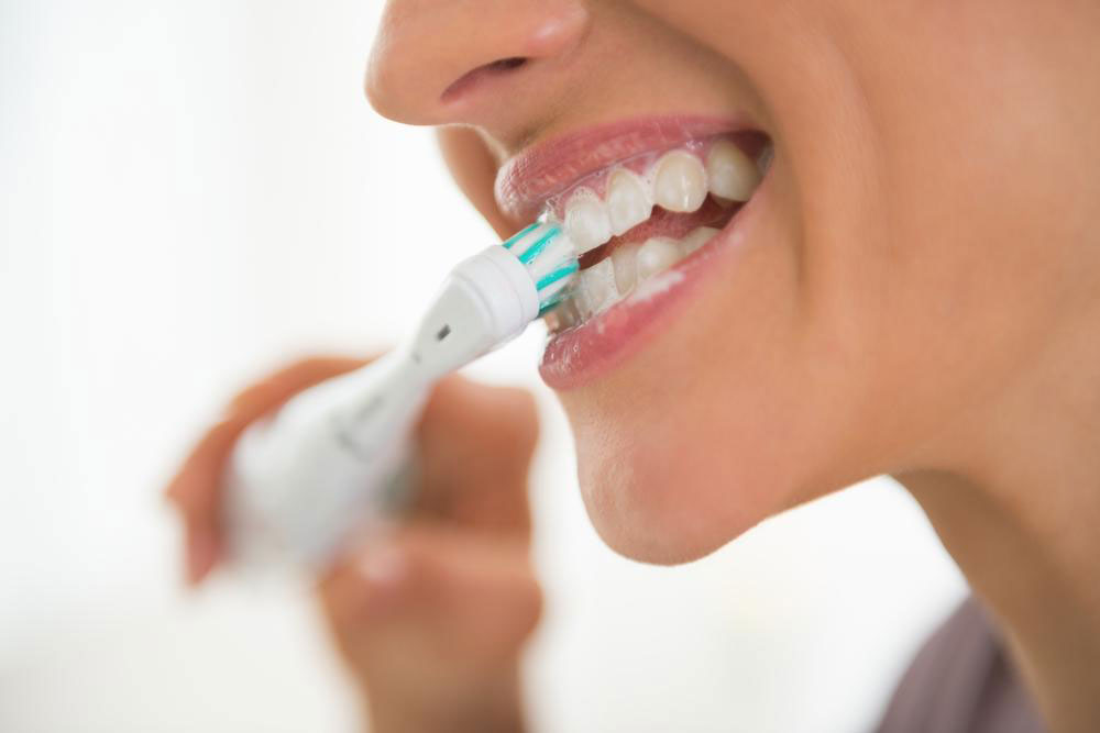 Essential Oral Hygiene Tips Using an Electric Toothbrush