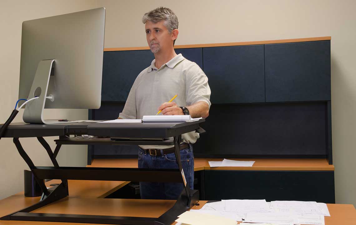 Revolutionize Your Workspace with Adjustable Standing Desks