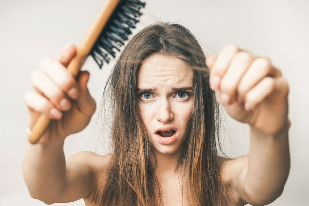 Understanding Hair Loss: Key Symptoms and Underlying Causes