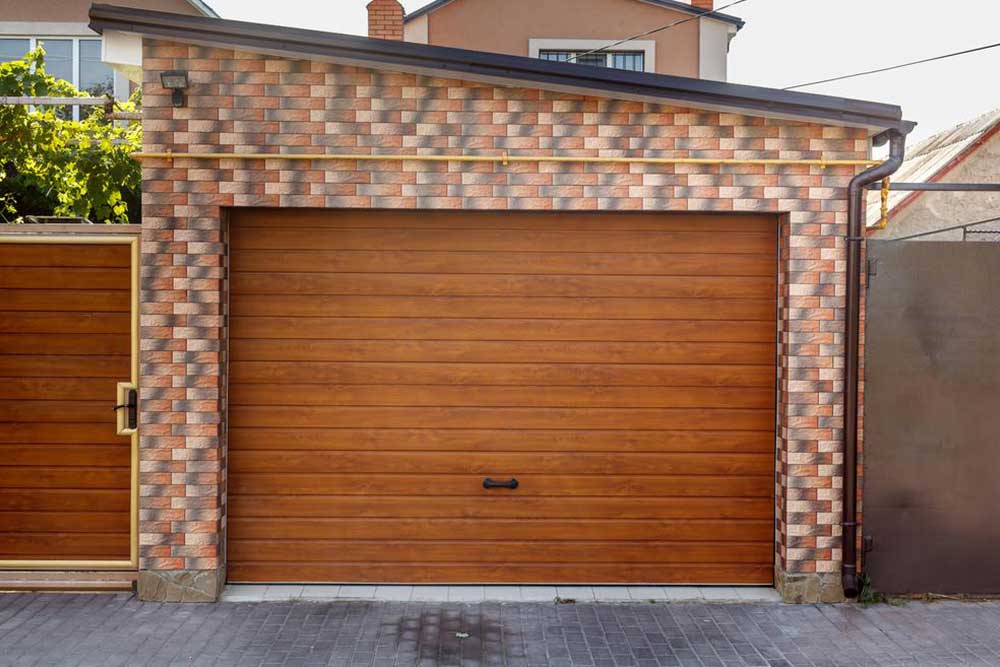 Enhancing Asset Security with Proper Garage Door Maintenance