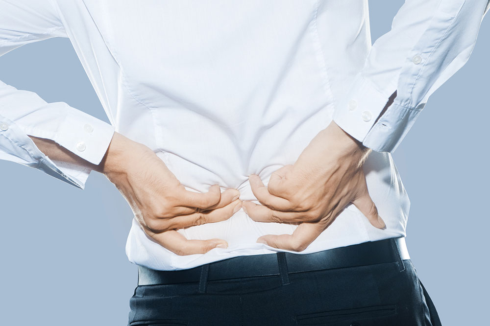 Understanding Back Discomfort: Symptoms, Causes, and Natural Relief Strategies