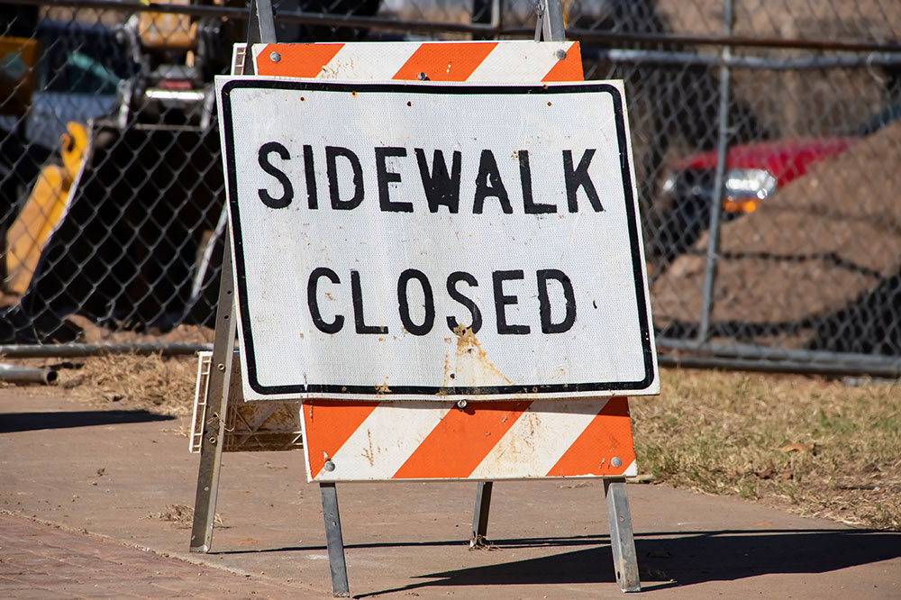 The Significance and Proper Positioning of Sidewalk Closure Signs