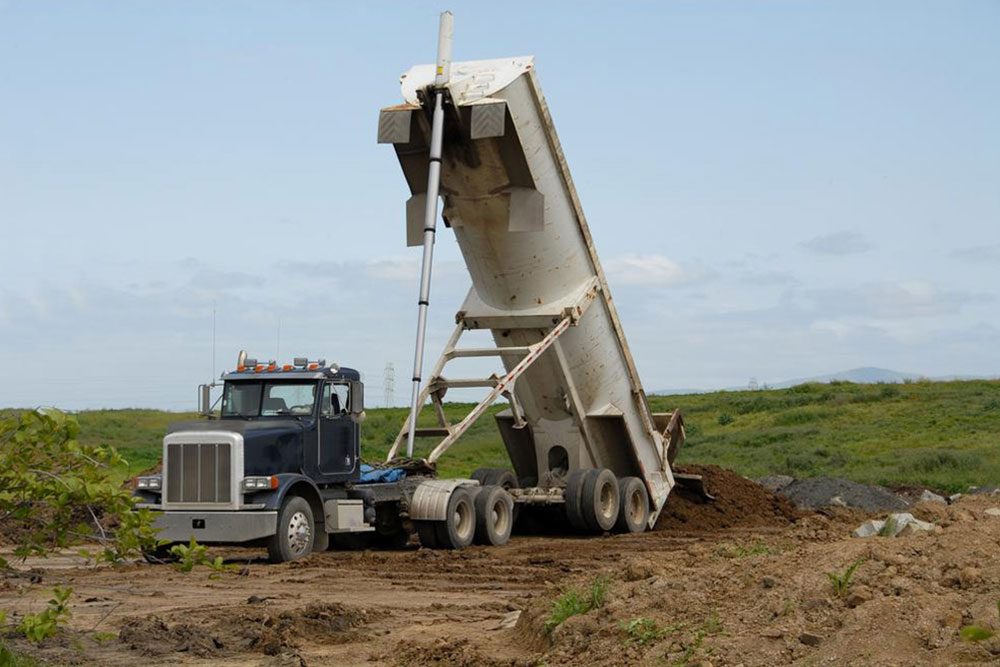 Choosing the Best Dump Trailer: End vs. Side Models for Your Construction and Mining Projects